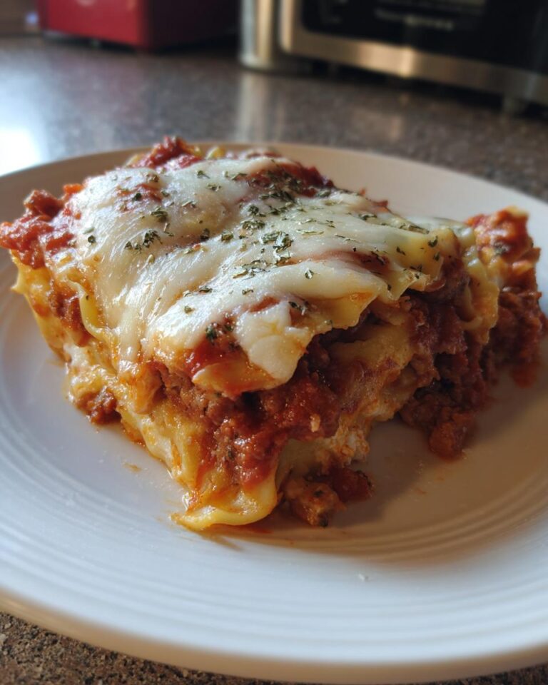 Crockpot Ravioli Lasagna – The Easiest Cheesy Comfort Food! 🧀🍅